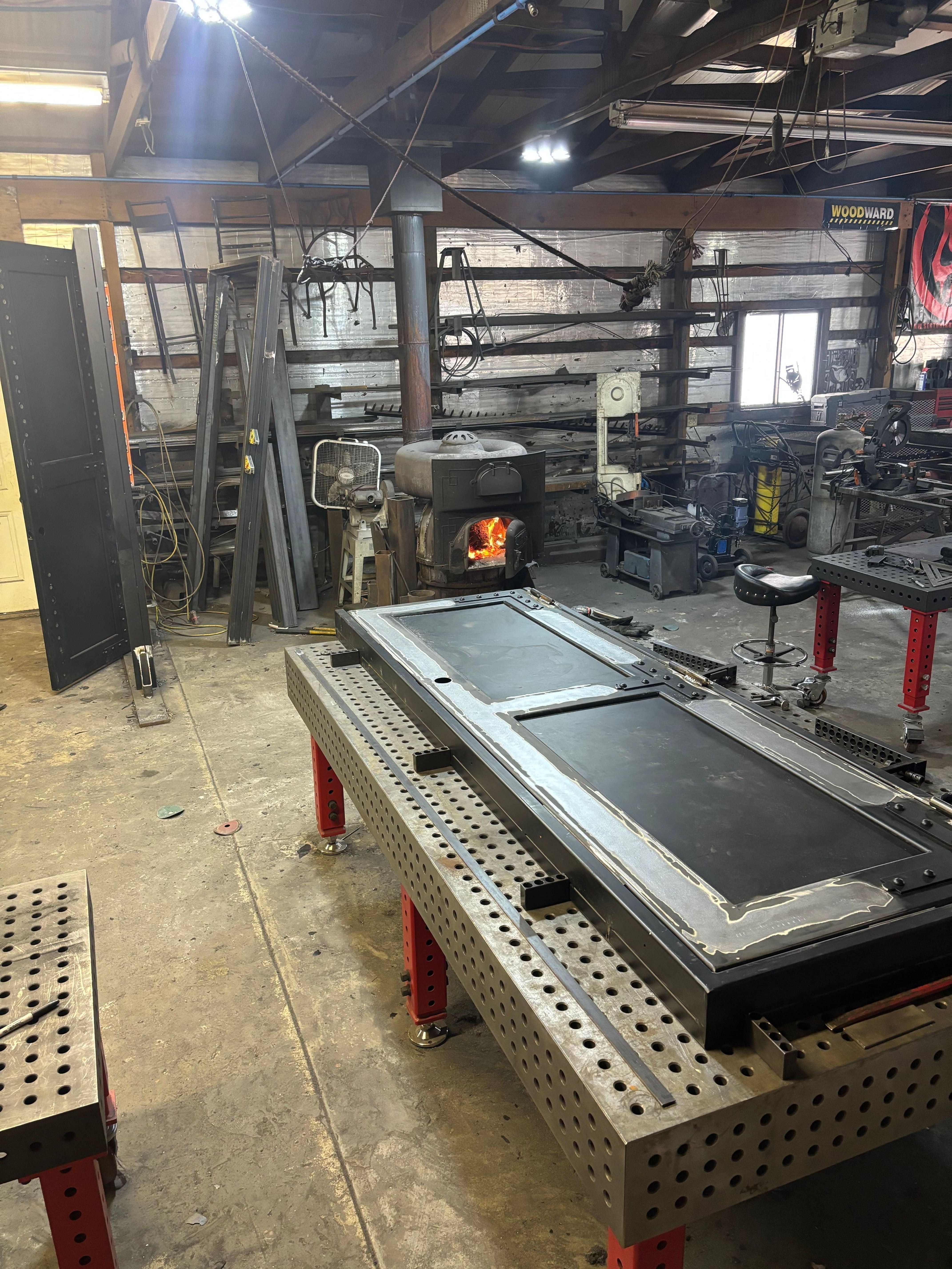 Bespoke steel entry door with hand-forged hardware, Traverse City