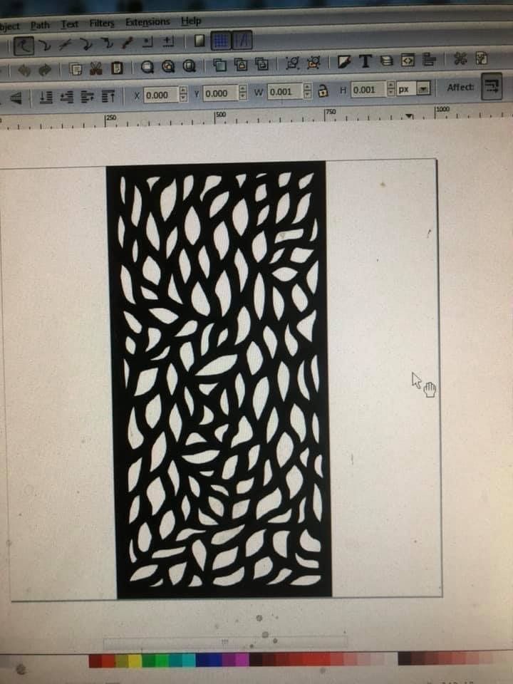 Hand-cut decorative steel sheet pattern revealing traditional blacksmithing texture